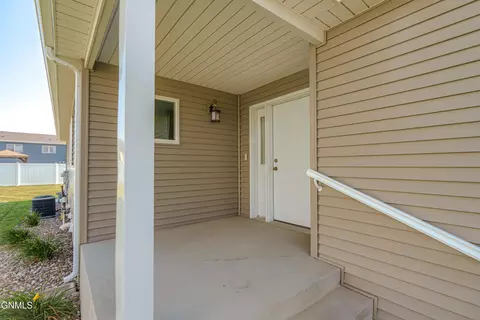 Exterior - 235 Irvine Loop, Bismarck, ND 58504 photo 5 of 12