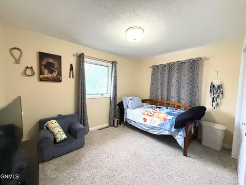 Bedroom - 2316 8th Ave E, Williston, ND 58801 photo 2 of 5