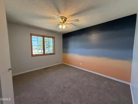 Bedroom - 417 7th St NW, Beulah, ND 58523 photo 3 of 9