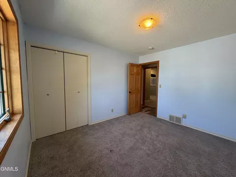 Bedroom - 417 7th St NW, Beulah, ND 58523 photo 2 of 9
