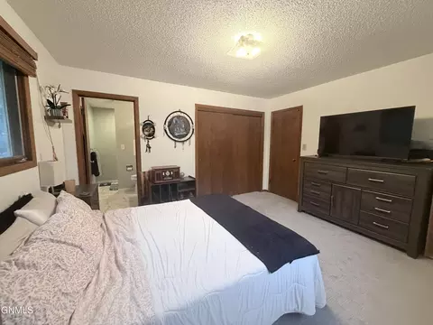 Bedroom - 509 Lohstreter Rd NW, Mandan, ND 58554 photo 2 of 6