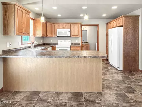 Kitchen - 214 9th Ave S, Carrington, ND 58421 photo 8 of 9