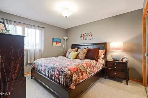 Bedroom - 711 13th St W, Williston, ND 58801 photo 2 of 3