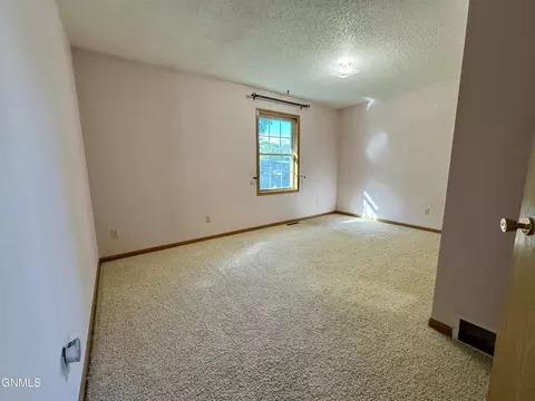 Bedroom - 28 Santee Rd, Lincoln, ND 58504 photo 1 of 2
