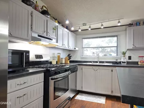 Kitchen - 2500 Centennial Rd, Bismarck, ND 58503 photo 4 of 6