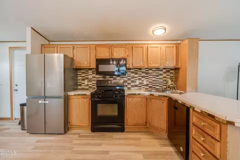 Kitchen - 208 E Coyote St, Mandan, ND 58554 photo 1 of 3