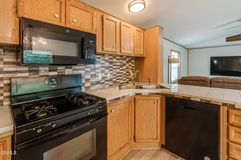Kitchen - 208 E Coyote St, Mandan, ND 58554 photo 2 of 3