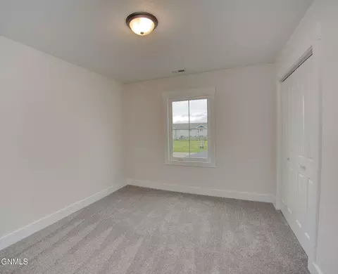 Bedroom - 509 46th St E, Williston, ND 58801 photo 4 of 4