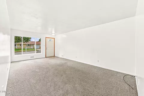 Living - 208 E Turnpike Ave, Bismarck, ND 58501 photo 2 of 2