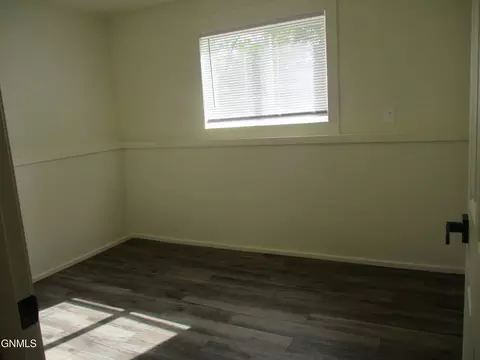 Bedroom - 1723 30th St W, Williston, ND 58801 photo 6 of 8