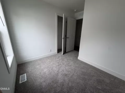 Bedroom - 703 6th Ave SE, Mandan, ND 58554 photo 3 of 3