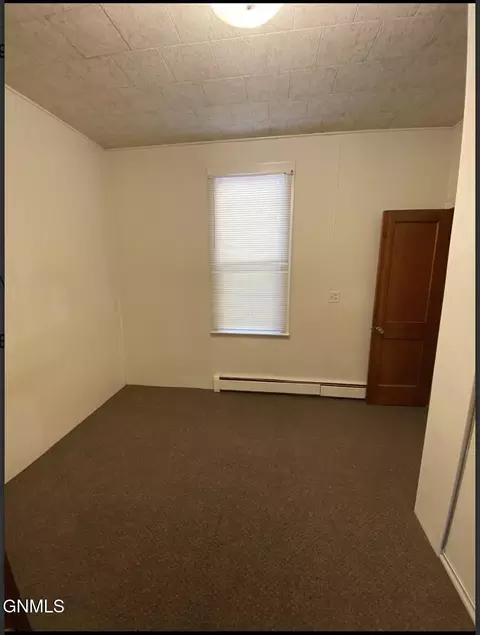 Bedroom - 409 Collins Ave, Mandan, ND 58554 photo 1 of 6