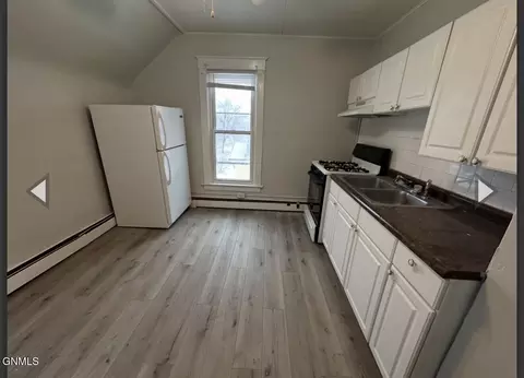 Kitchen - 409 Collins Ave, Mandan, ND 58554 photo 3 of 5