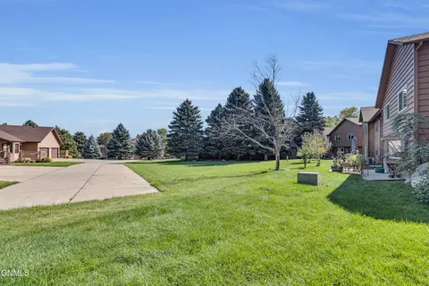 Exterior - 420 E Brandon Dr, Bismarck, ND 58503 photo 6 of 14