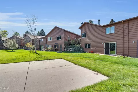 Exterior - 420 E Brandon Dr, Bismarck, ND 58503 photo 7 of 14