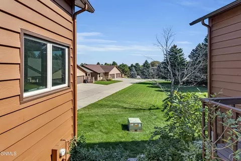 Exterior - 420 E Brandon Dr, Bismarck, ND 58503 photo 10 of 14