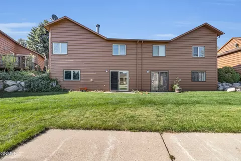 Exterior - 420 E Brandon Dr, Bismarck, ND 58503 photo 5 of 14