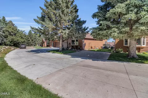Exterior - 420 E Brandon Dr, Bismarck, ND 58503 photo 3 of 14
