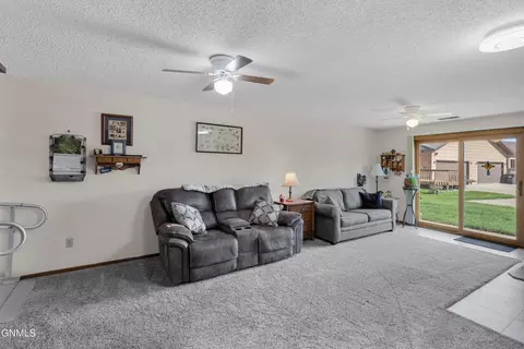 Living - 420 E Brandon Dr, Bismarck, ND 58503 photo 5 of 8