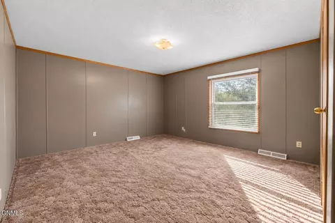 Bedroom - 3817 2nd Ave E, Williston, ND 58801 photo 10 of 12