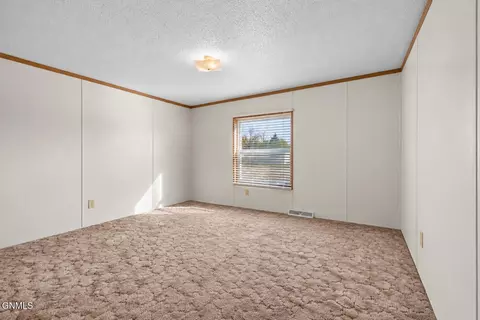 Bedroom - 3817 2nd Ave E, Williston, ND 58801 photo 6 of 12