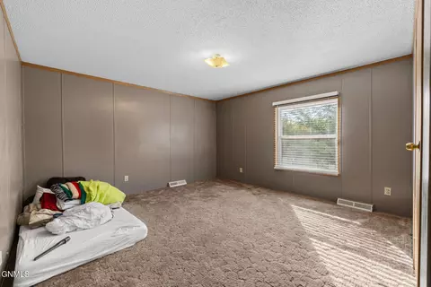 Bedroom - 3817 2nd Ave E, Williston, ND 58801 photo 9 of 12