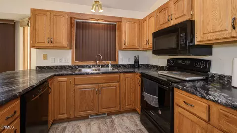 Kitchen - 4118 34th Ave NW, Mandan, ND 58554 photo 3 of 3