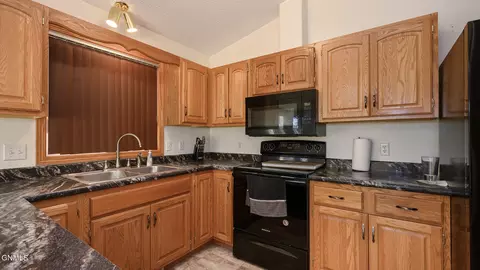 Kitchen - 4118 34th Ave NW, Mandan, ND 58554 photo 2 of 3