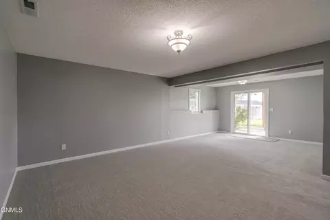 Living - 4725 Calgary Ave E, Bismarck, ND 58503 photo 2 of 2