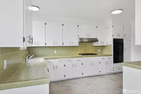 Kitchen - 635 Prague St, San Francisco, CA 94112 photo 1 of 4