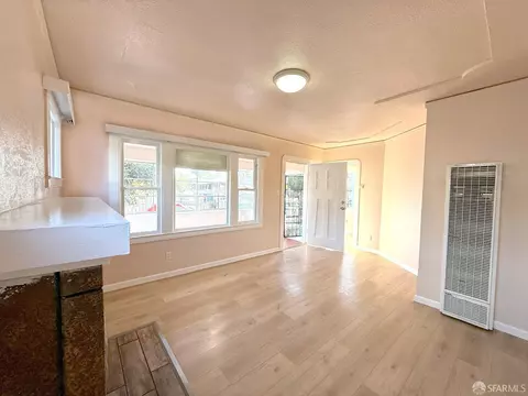 Living - 1233 60th Ave, Oakland, CA 94621 photo 2 of 3