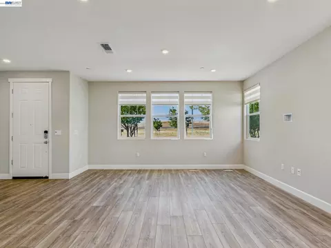 Living - 233 E Central Pkwy, Mountain House, CA 95391 photo 7 of 12
