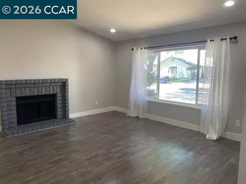Living - 945 Arambel Dr, Patterson, CA 95363 photo 2 of 4