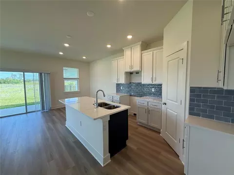 Kitchen - 13978 Emerald Fields Dr, Hudson, FL 34667 photo 2 of 8