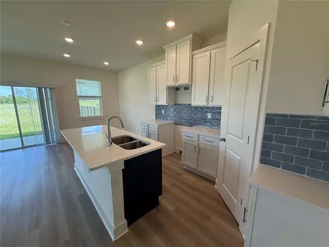 Kitchen - 13978 Emerald Fields Dr, Hudson, FL 34667 photo 3 of 8