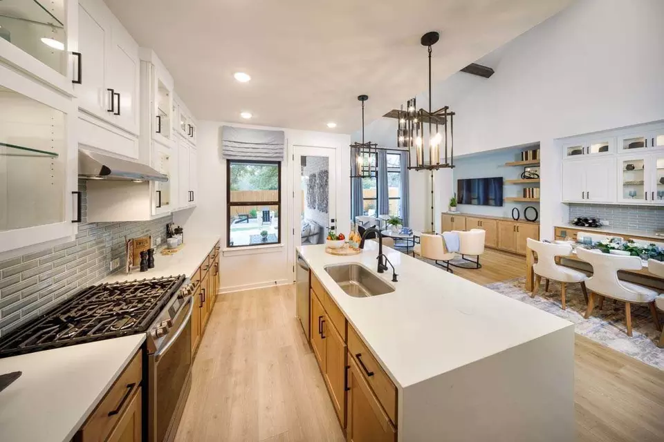 Kitchen - Plan Bernini - 5611 Kyle Joseph Dr, Georgetown, TX 78628 photo 6 of 7