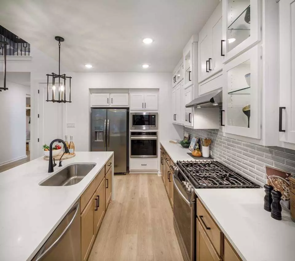 Kitchen - Plan Bernini - 5611 Kyle Joseph Dr, Georgetown, TX 78628 photo 3 of 7