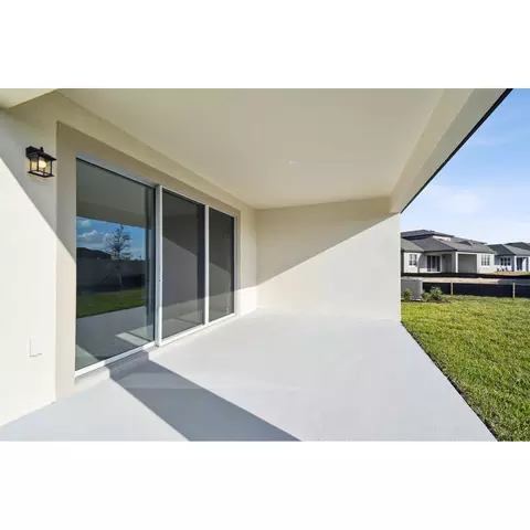 Exterior - 2430 Clary Sage Dr, Spring Hill, FL 34609 photo 5 of 11