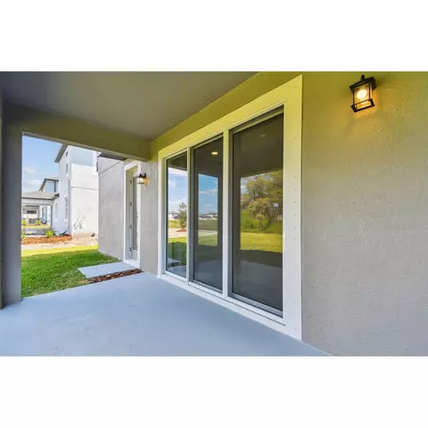 Exterior - 5046 Bromeliad Ave, Wimauma, FL 33598 photo 9 of 13