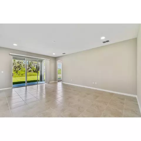 Living - 5046 Bromeliad Ave, Wimauma, FL 33598 photo 3 of 5
