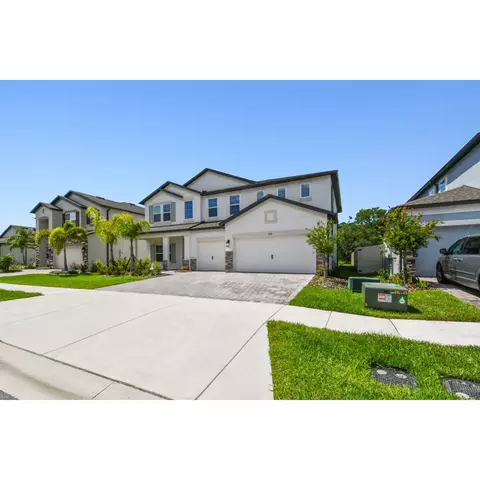 Exterior - 5016 Bromeliad Ave, Wimauma, FL 33598 photo 3 of 11