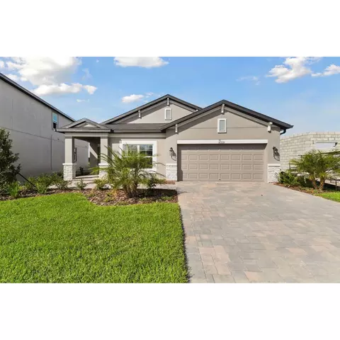 Exterior - 31229 Denham Ridge Ln, Wesley Chapel, FL 33545 photo 2 of 11