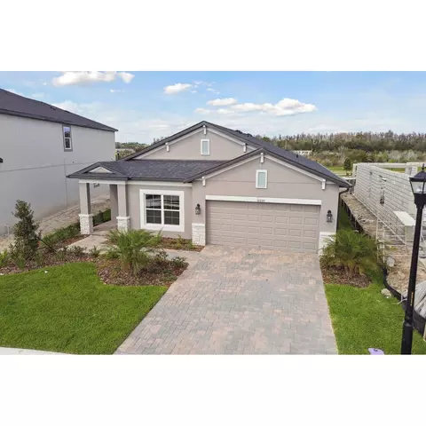 Exterior - 31229 Denham Ridge Ln, Wesley Chapel, FL 33545 photo 3 of 11