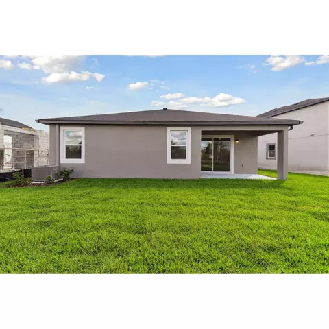 Exterior - 31229 Denham Ridge Ln, Wesley Chapel, FL 33545 photo 6 of 11