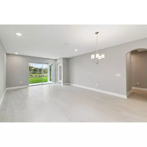 Living - 31229 Denham Ridge Ln, Wesley Chapel, FL 33545 photo 2 of 3