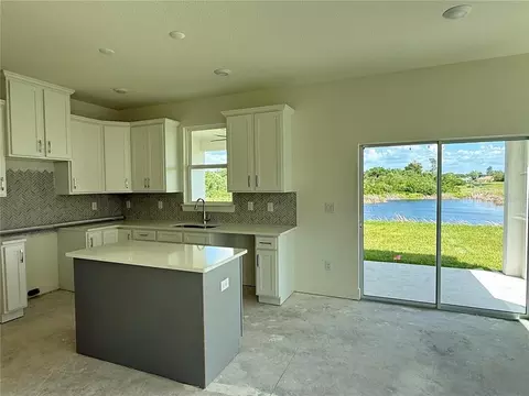 Kitchen - 14004 Emerald Fields Dr, Hudson, FL 34667 photo 2 of 6