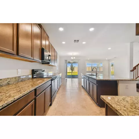 Kitchen - 4909 Eagle Rock Dr, Wimauma, FL 33598 photo 2 of 7