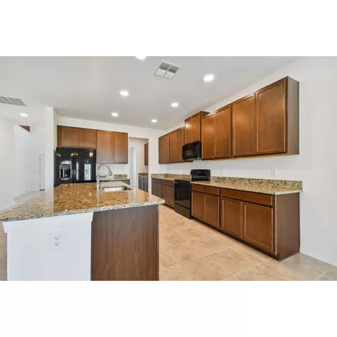 Kitchen - 4909 Eagle Rock Dr, Wimauma, FL 33598 photo 6 of 7