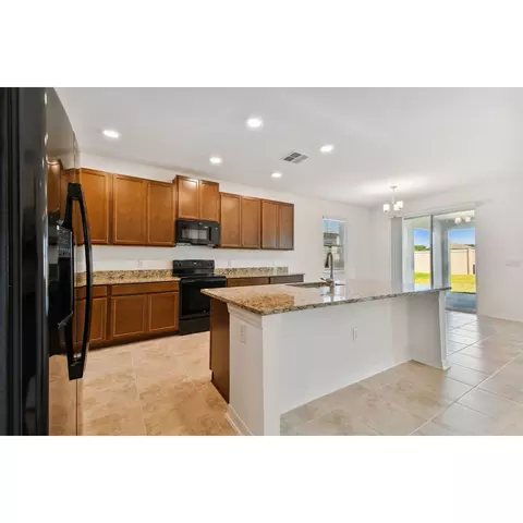 Kitchen - 4909 Eagle Rock Dr, Wimauma, FL 33598 photo 5 of 7