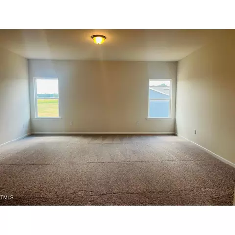 Bedroom - 74 E American Marigold Dr, Benson, NC 27504 photo 2 of 3
